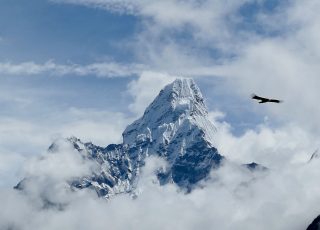 snow covered mountain under blue sky during daytime